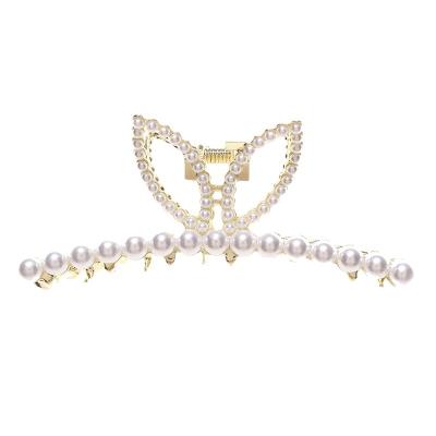 China YiYi Wholesale Hair Accessories Korean Fashion Hair Claws Big Pretty Bead Bunny Ears Metal Hair Claws Clips For Women for sale