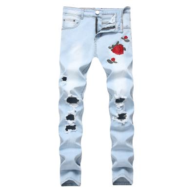 China New plus size men's denim stretch lattice with pink flower embroidered ripped man slim fit culottes pants design ripped blue jeans for sale