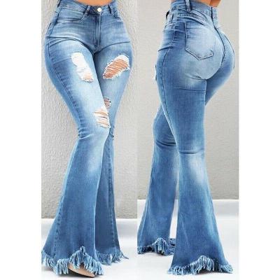 China Viable Wholesale Wide Leg Denim Pants Women Ladies High Waist Ripped Bell Bottoms Hot Tassel Jeans for sale