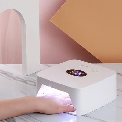 China ABS LED Nail Lamp 54w Cordless Rechargeable UV Lamp Beads 30pcs 9600mAh Cordless Flash Cure Nail Lamp For Salon Home Use for sale