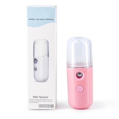 China Handy Mini Mist Portable Facial Skin Home Instrument Facial Moisture Care Nano Water Steamer Nano Sprayer Electric Face Replenishment Jet for sale