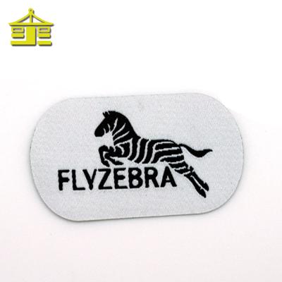 China Sustainable Iron On Self Adhesive Logo Heat Press Custom Fabric Cloth Patches For Apparel for sale