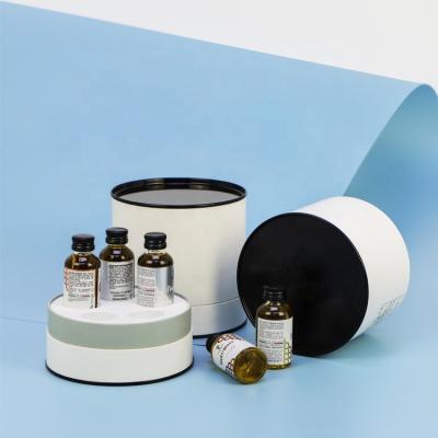 China Recycled Cosmetic Materials Gift Skin Care Round Shape Packing Box White Paper Tube For E Liquid Bottle Essential Oil for sale