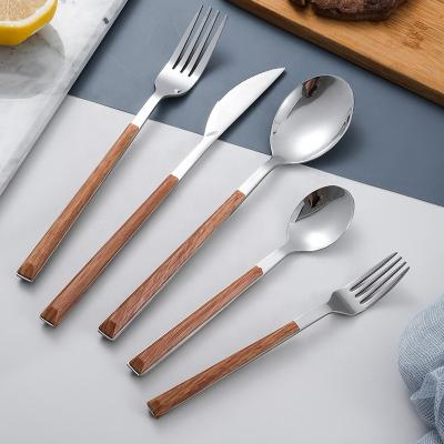 China Viable Wholesale plastic wedding flatware sets knife fork spoon silverware set stainless steel cubiertos handle wood texture cutlery sets for sale