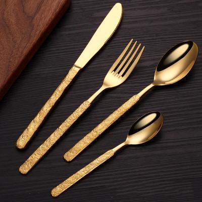 China Vintage Relief Surface Gold Cutlery Set 4pcs 304 Stainless Steel Mirror Spoons And Forks Viable Gold Flatware Sets For Wedding for sale