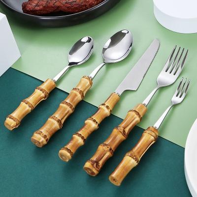 China 304 Stainless Steel Flatware Sets Real Design Handle Bamboo Cutlery Set Flatware Spoon Knife Eco-Friendly Single Viable Bamboo Fork for sale