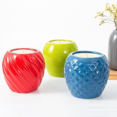 China Home Decoration Scented Candle Holder Embossed Design Colored Wax Jars Like Ceramic Empty Candle Jars In Bulk for sale