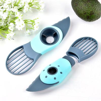 China Durable Porcelain PP Household Items Fruit Tool 3 In 1 Avocado Slicer for sale