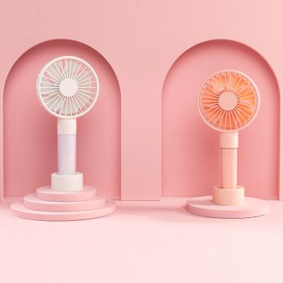 China Protable Mini Handheld Fan With Colorful Portable Light Sports USB Rechargeable Fan With 3 Gears Desktop Standing Bass Fan For Outdoor for sale