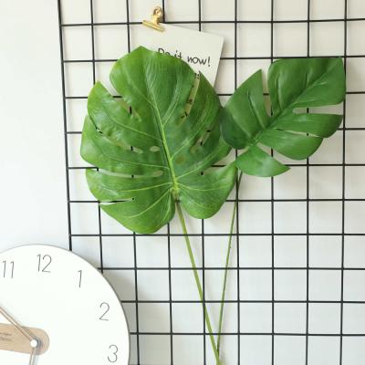 China Indoor Monstera Deliciosa Plastic Silk Artificial Leaves Flower Arrangement Supply Planning Event Planning Faux Plants Green Decor for sale