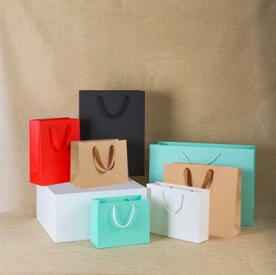 China Shop Recyclable Fashionable Customized Shopping Logo Printing Design Recycle Garment Kraft Flip Paper Bags Marble for sale