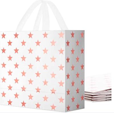 China Medium Recyclable Gift Bags With Handles Recyclable Paper Gift Bags Bulk Rose Gold Star Party Favor Bags For All Occasions for sale