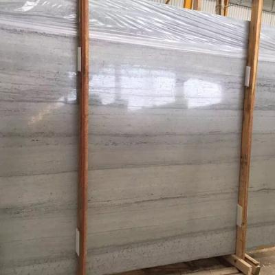 China Modern Cheap Price Natural Inlay Slabs Polished Blue Wooden Marble Flooring Tiles for sale