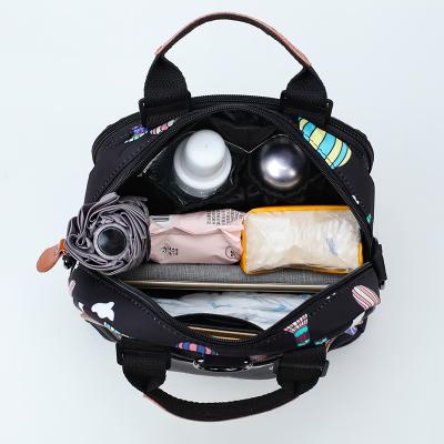 China Promotional Diaper Bag New Fashion Mummy Backpack Large Capacity Zipper Backpack Multifunctional Travel Bag for sale