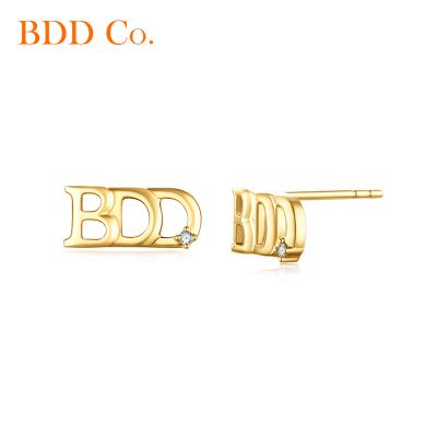 China FASHIONABLE 18k Gold Stud Earrings Natural Diamond Original Design Letter Element Gold Stud Earrings For Women for sale