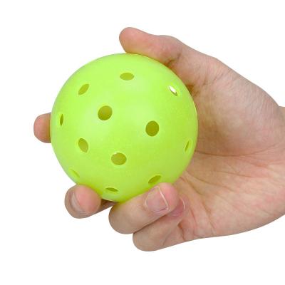 China Customized one piece molded 40 holes 74mm outdoor pickleball spinning balls duroable for outdoor sports for sale