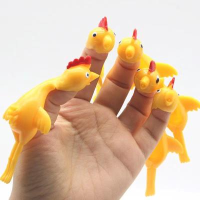 China Stress Relax Rubber Chicken Finger Flying Toy Amazon Most Popular Ejection Turkey Rubber Chicken Slingshot Stretchy Toy For Child for sale