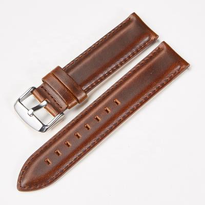 China Reminder Spring Leather Bar Quick Taurus Watch Strap Genuine Leather Needle Buckle OEM Customized Logo for sale