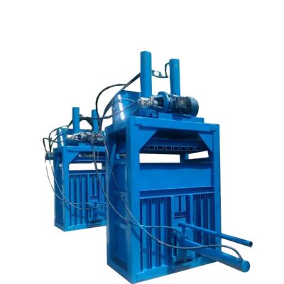 China CLOTHING Used Garments And Textile Compress Waste Paper Baler Wrapping Machine for sale