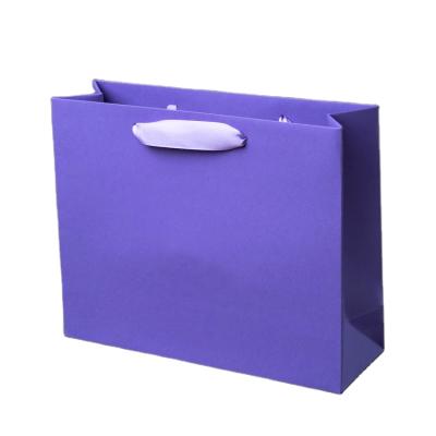 China Custom Unique Materials Color Elegant Purple Recycled Boutique Kraft Foldable Packaging Shopping Bags With Cotton Rope Handles for sale