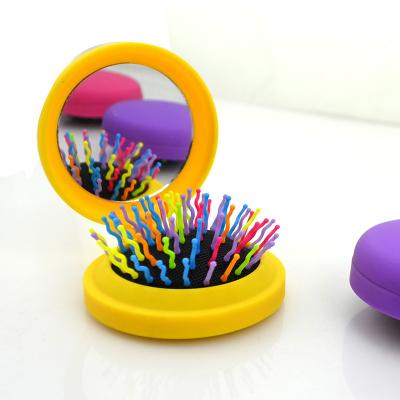 China Hot Selling Double Sided Plastic Mini Pocket Mirror Pocket Mirror with Hair Brushes for sale