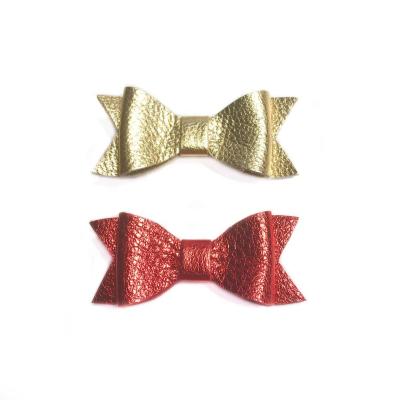 China Fashion Holiday Red Christmas Bow Clips \ Real Leather Bow Custom Made Comfy \ Durable Kids Hair Bow for Girls for sale