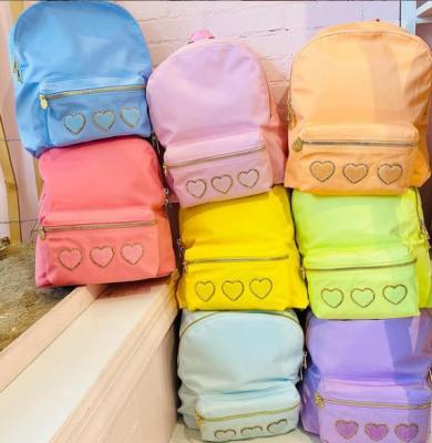 China Waterproof New Macaron Handbag Travel Logo Backpack 2021 Large Light Pink Nylon Backpack Running Nylon Customizable Candy Color for sale