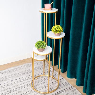 China Marble type flower pot rack Nordic single iron Europe 2023 light luxury multi-layer light luxury floor stand for sale