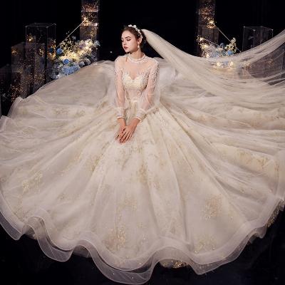 China High quality temperament anti-static bridal french hepburn illusion garden long sleeve main wedding dress for sale