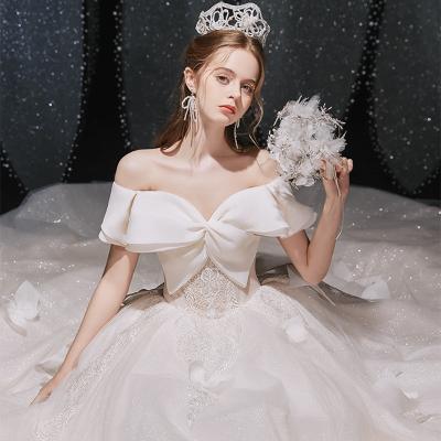 China Summer Anti-Static Ball Gown Lace Up One Word Strap Big Tail Boat Neck Satin Korean Romantic Wedding Dress for sale