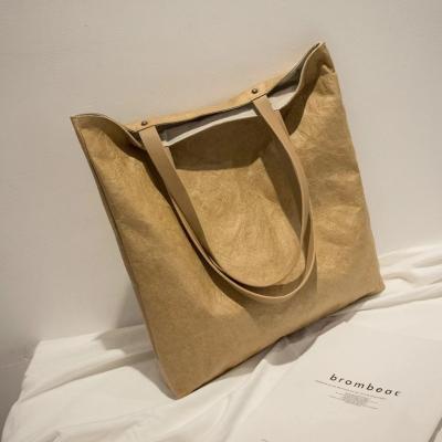 China Recyclable Washable Kraft Paper Storage Bag Handbag for sale