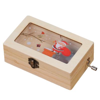 China New Fashional 2021 Santa Claus Christmas Gift for Children's Wooden Music Boxes Christmas Hand Crank Operated Music Box for sale