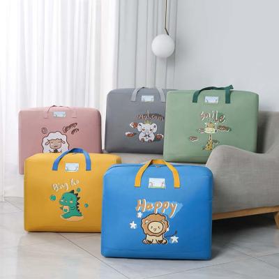 China Durable Quilt Bag Cartoon Cloth Oxford Travel Storage Moisture Proof Bag Organize Cartoon Storage Bag for sale