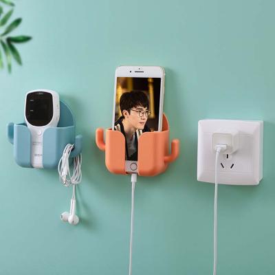 China Viable Mobile Phone Storage Box Wall Mount Stand Storage Punch-free Remote Control Holder for sale