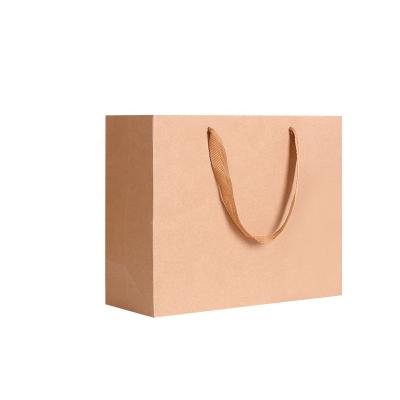 China Recycled Materials 260 Gram Large Size Luxury Clothing Packaging Recycled Brown Paper Bag Gift Custom Paper Bag Packaging Paper Bag for sale