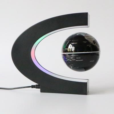 China UFO Magic Shape Rotating Floating Globe For Decoration for sale