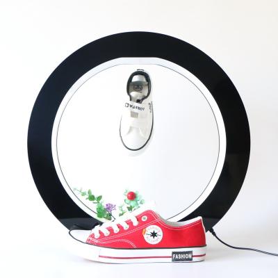 China Maglev round maglev shoe display rack rotating magnetic levitation products for sale