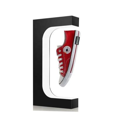 China Acrylic Drop Shipping Magnetic Floating Rotating Display Stand Retail Levitating Shoe For Front Store Advertising Show Display for sale