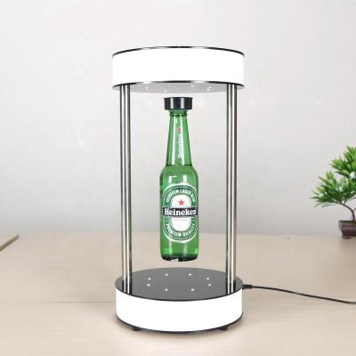 China Display Levitating Magnetic Levitating Acrylic Rotating Floating Magnetic Levitating Display Advertising Wine Bottle Display Rack Beer Bottle for sale