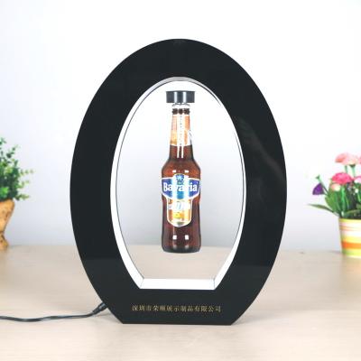 China Latest 2022 Acrylic Products Trade Show Advertising Display Rack 500g 1kg 2kg Rotating Acrylic Magnetic Levitating Beverage Customized for sale