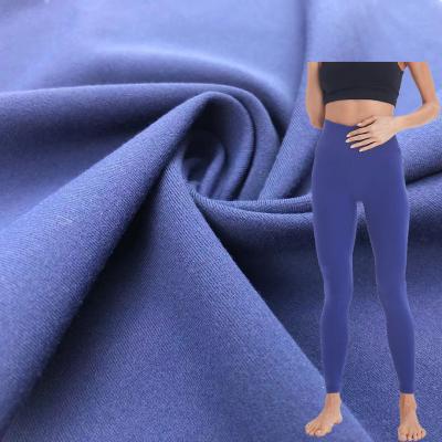 China Double Faced Stock Polyester 4 Way Stretch Spandex Yoga Sportswear Dry Fit Fabric With Double Faced Brushed for sale