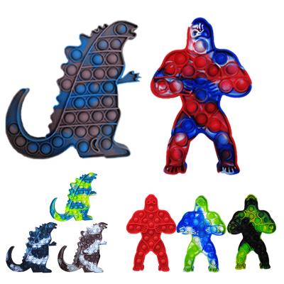 China Best Selling Eco-Friendly Tie-Dye Godzilla VS Kingkong Squeeze Toys Silicone Push Bubble Bouncing Person Kids Toys Other Toys With Noise for sale