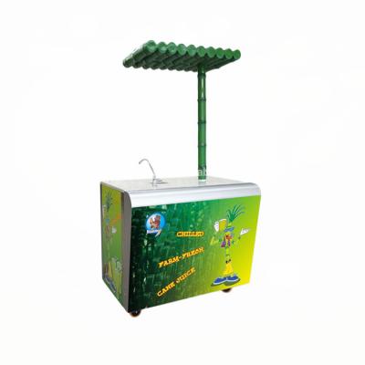 China Hotels Best quality sugarcane juice machine with cooler, cup dispenser and chiller for sale