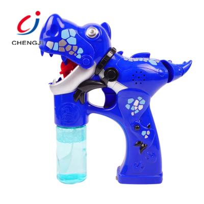 China Plastic Outdoor Toys Bubble Machine Light Electric Bubble Gun and Music Dinosaur for Kids for sale