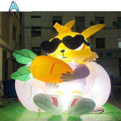 China Advertising& Toy Stage Backyard Doorway Inflatable Decoration LED Light Rabbit Carrot On Chair For Easter Celebration Decoration Flower for sale