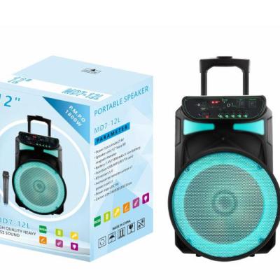 China Wireless Charger For Mobile Phone High Battery Capacity 12 Inch Trolley Speaker MIC Wireless Audio With USB /TF /FM Radio for sale