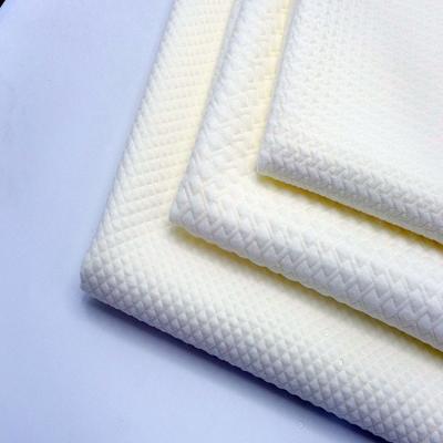 China Popular Shrink-resistant 280gsm 98polyester 2spandex solid sandwich jacquard knit fabric for garment for sale