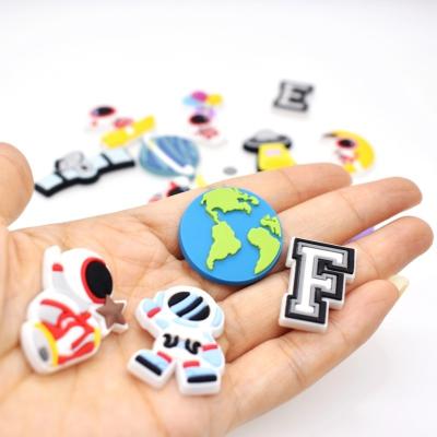 China Astronaut Themed Shoe Decoration 50PCS Shoe Charms For Wristband/Kids Cartoon Bracelet/Child Slip On/Treasure Kids Birthday Gift for sale