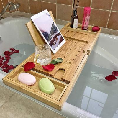 China Renature Wide Bamboo Stocked Tray Wooden Bathtub Adjustable Bath Holder and Organizer for Glass/Soap Toilet/Notepad/Mobile/Bathroom for sale