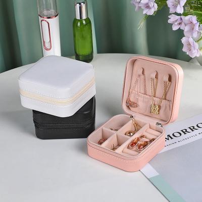 China Hot Selling Portable Multifunctional Leather Jewelery Boxes PU Jewelry Box Organizer Small Travel Storage Box Wholesale Leather Jewelry Case for sale